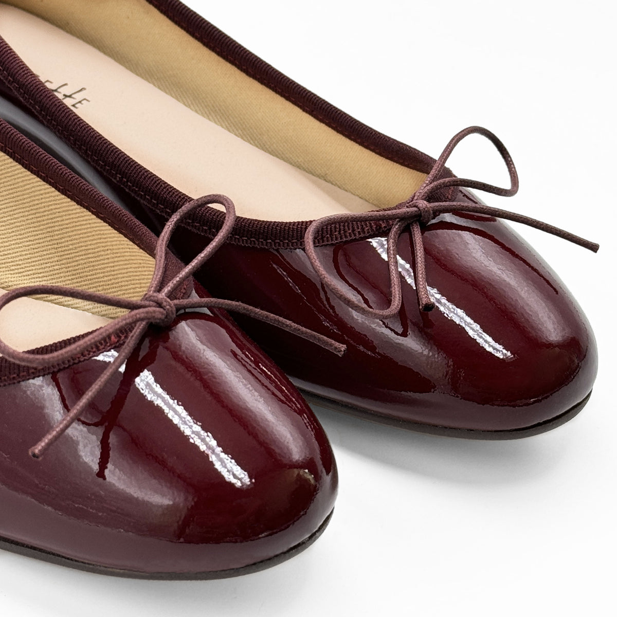 Bordeauxfarben Ballerinas aus Lackleder