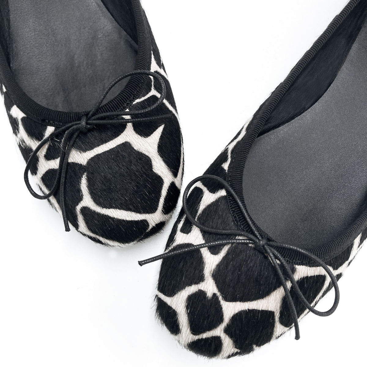 Black and white animal print ballet flats