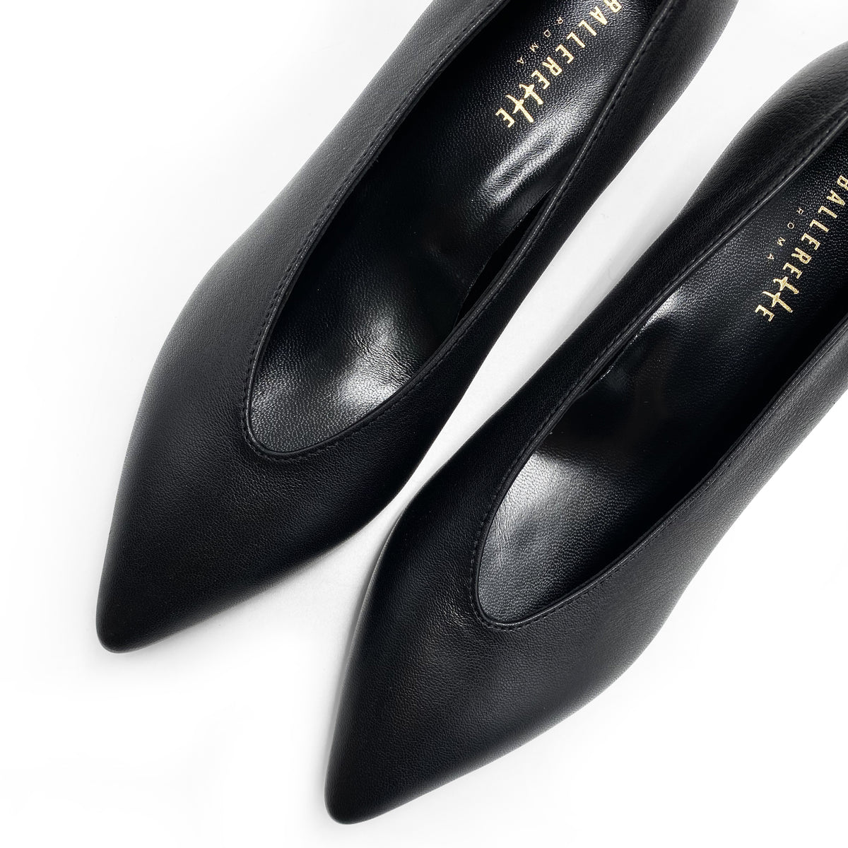 Scarpe décolleté nere in pelle con scollo a V e tacco