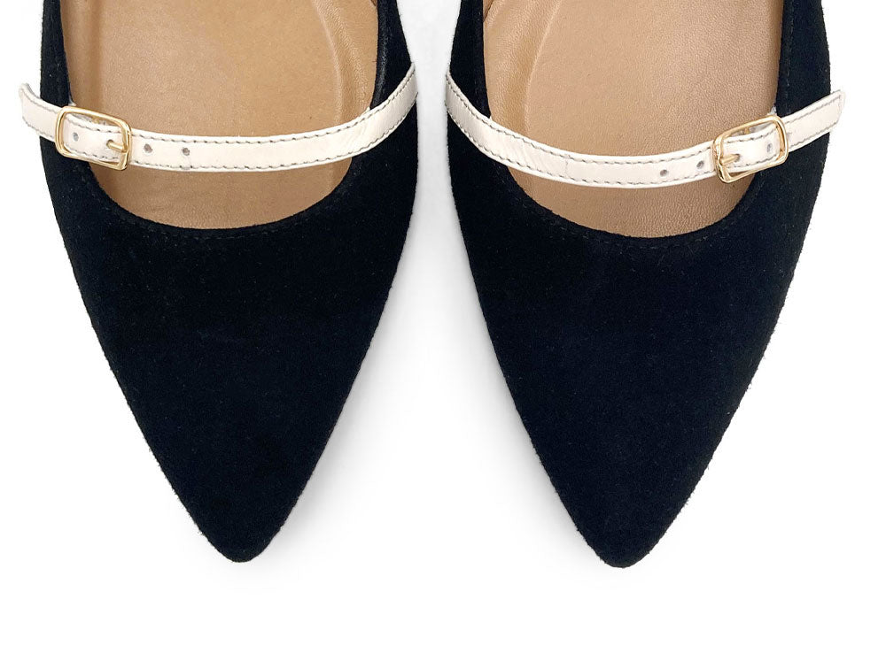 Black suede ballet flats with cream straps