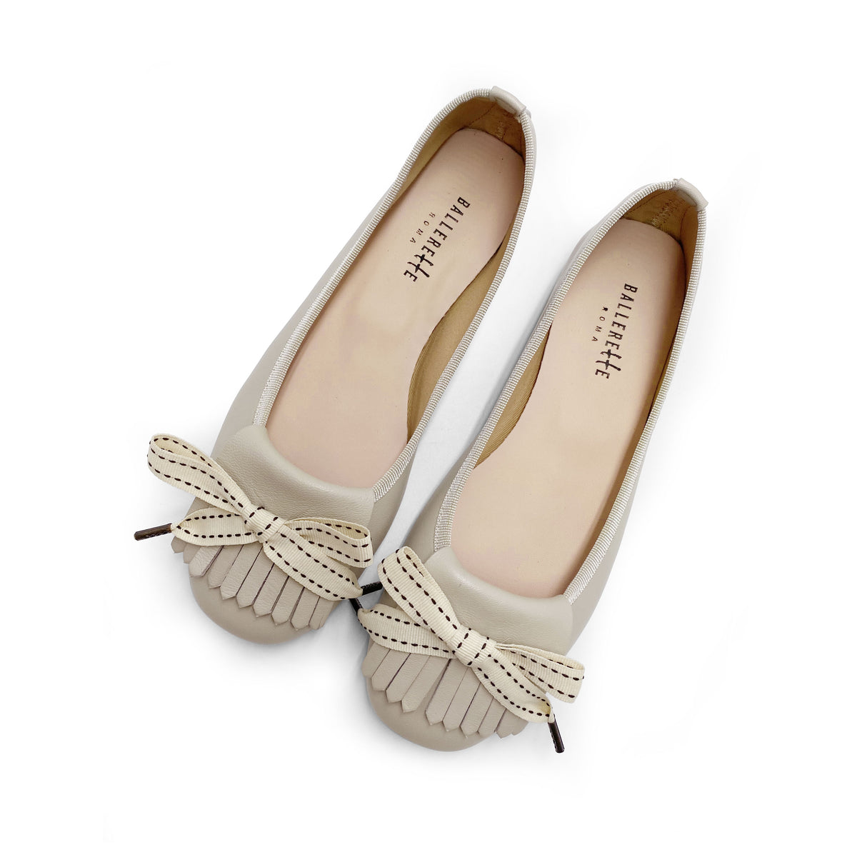 Beige Leder-Slipper mit Absatz und Fransen