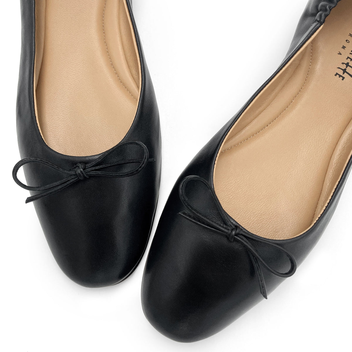 Black leather ballet flats with sacchetto construction