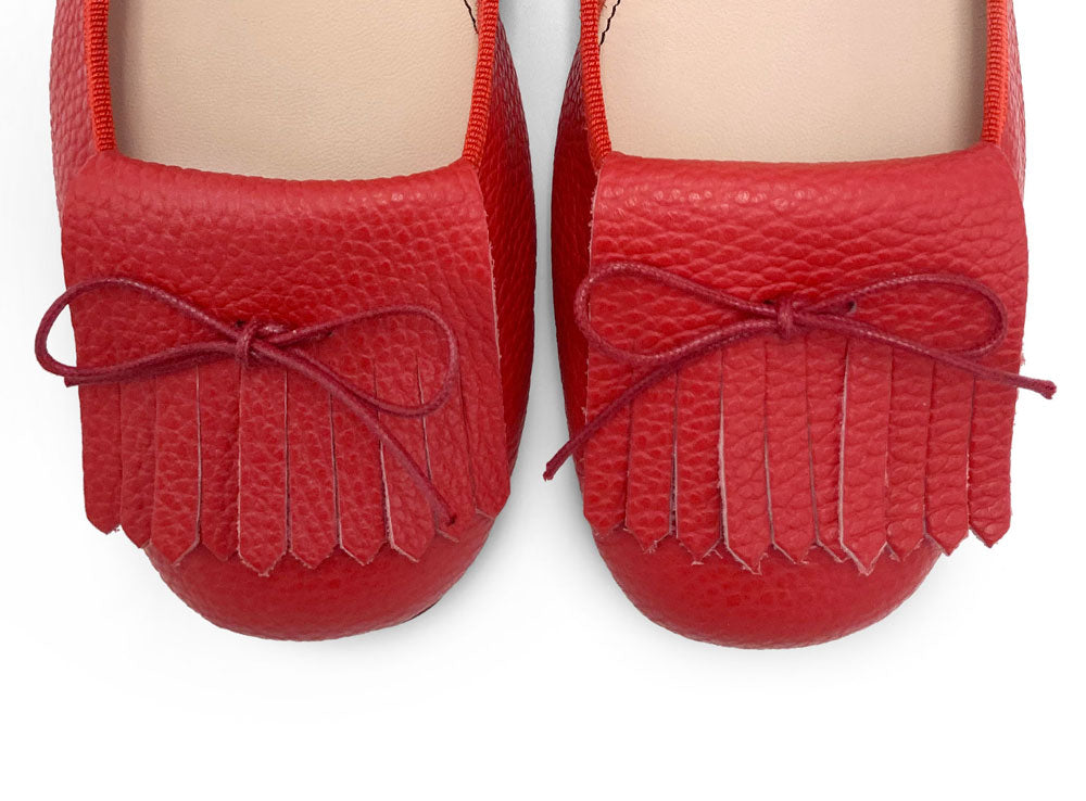 Mocasines de mujer rojos de piel con flecos