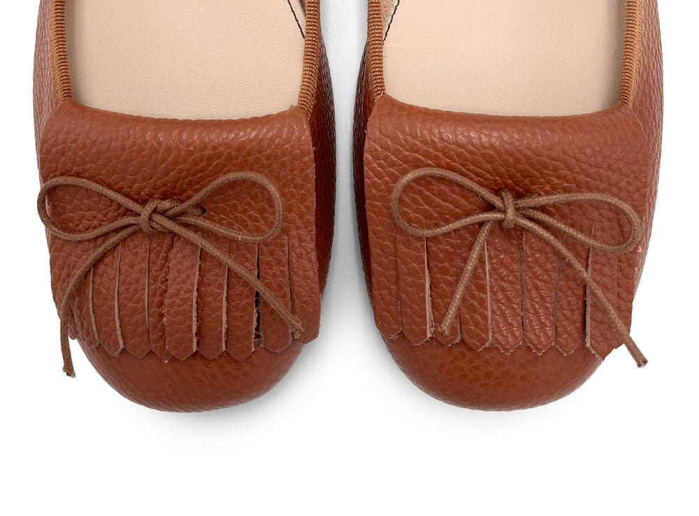 Mocasines de mujer en piel marrón terracota con flecos