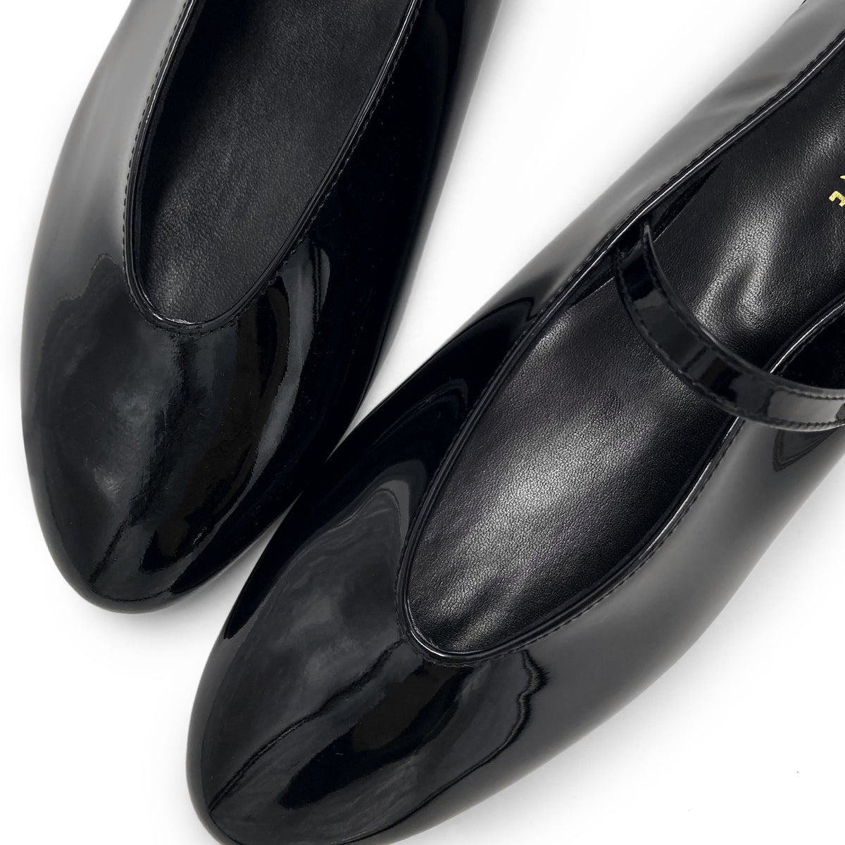 Black patent leather Mary Jane ballet flats with V-cut and jewelled strap